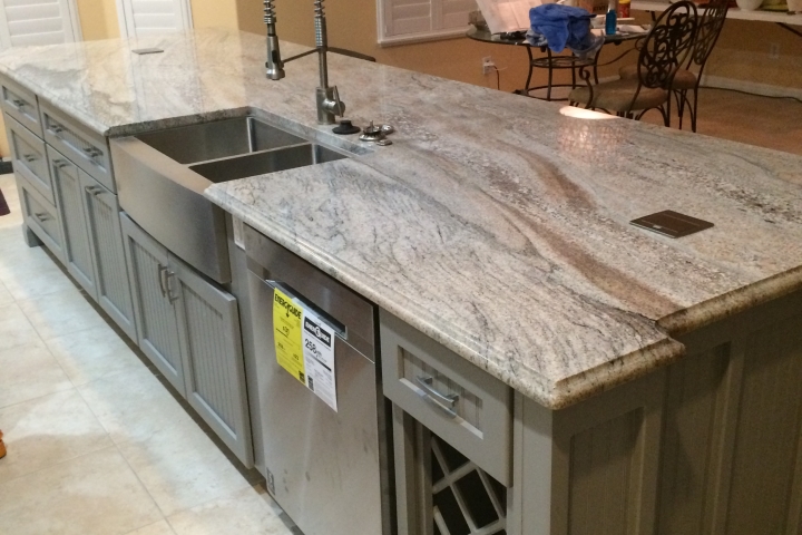 oversize island with detail panels on each end