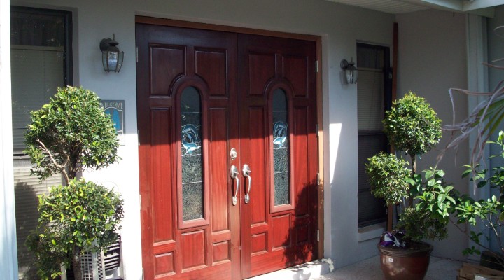 Mahogany front doors with custom glass