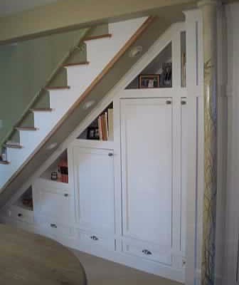 Built-in storage under stairs